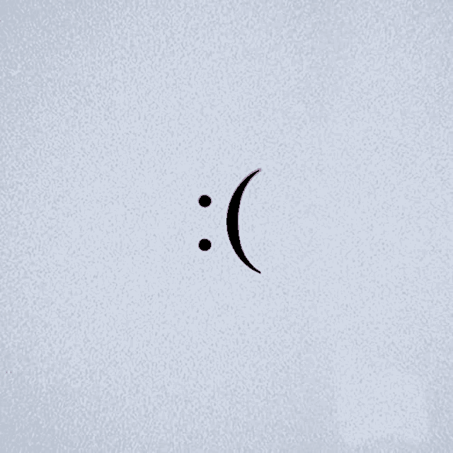 a purple smiley face with two dots on a white background .