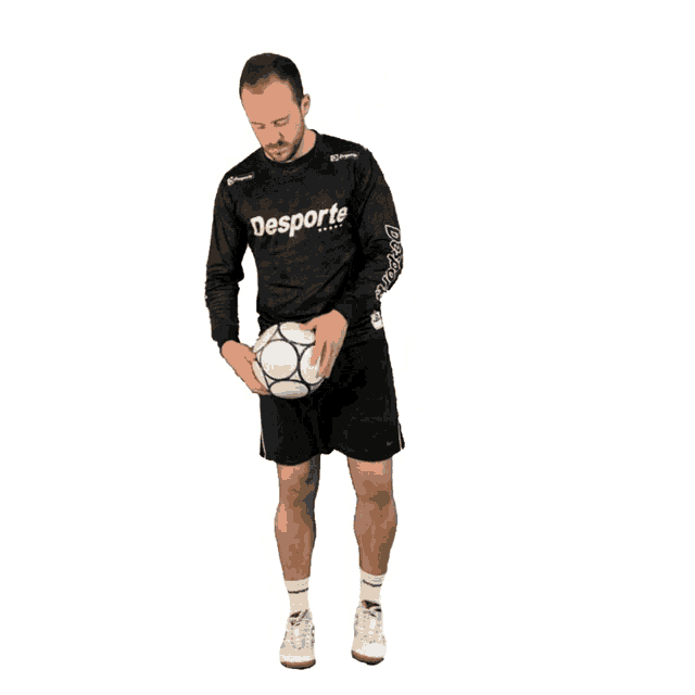 a man wearing a black shirt that says desporto on it