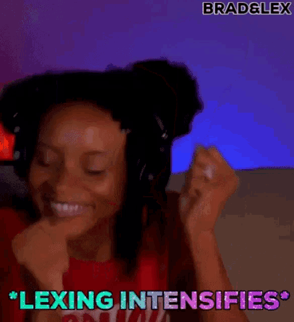a woman wearing headphones and a red t-shirt is smiling and says lexing intensifies .
