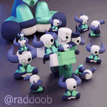 a group of stuffed animals with horns are sitting on a table with the name raddoob on the bottom