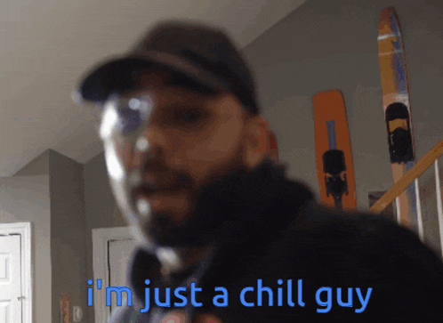 a man says i 'm just a chill guy in blue letters