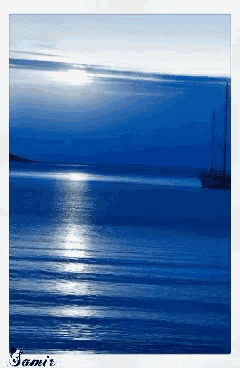 a picture of a blue ocean with the name samir on the bottom right