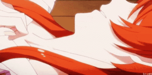 a close up of a person 's neck and red hair .