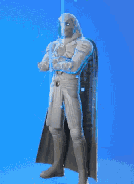 a statue of a man with a hood and a cape with the words gangnam style on it