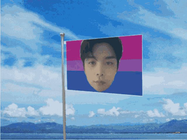 a flag with a picture of a man on it