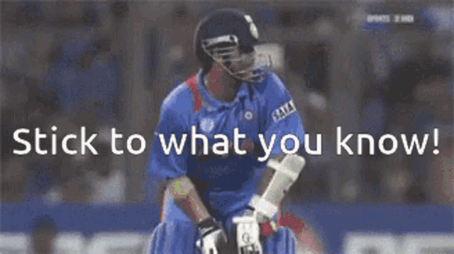 a cricket player is swinging a bat in front of a pepsi ad