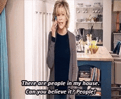 a woman is talking on a cell phone and says there are people in her house can you believe it people