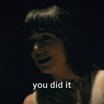 a close up of a woman 's face with the words you did it below her