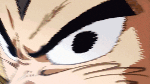 a close up of a cartoon character 's eyes with a very angry look on his face