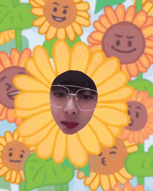 a person wearing glasses is surrounded by sunflowers with smiley faces