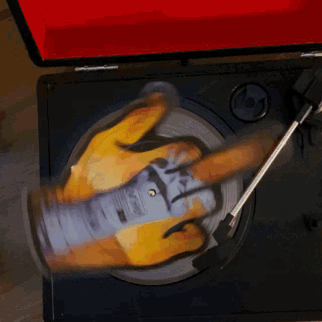 a record player with a picture of a dog on the record