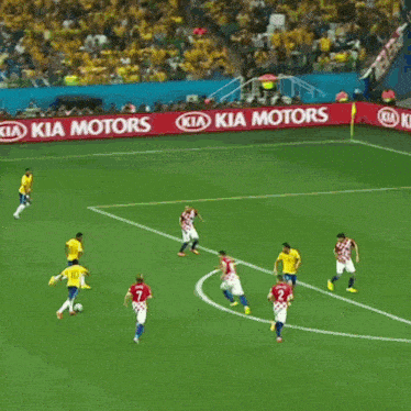 a soccer player wearing a yellow shirt with the number 10 on it