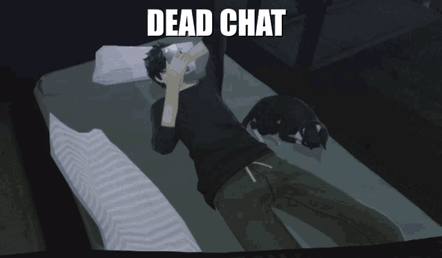 a man is laying on a bed with a cat and the text dead chat above him