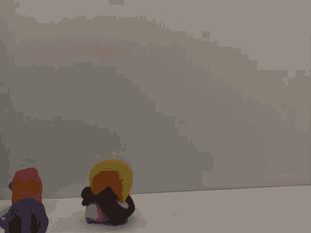 among us toys on a white surface with a white background