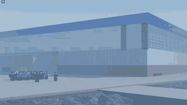 a group of people standing in front of a large blue building