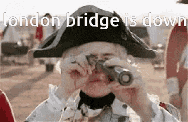 a man in a pirate hat is looking through a telescope with the words london bridge is down behind him .