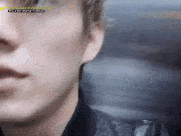 a close up of a person 's face with the words " plus behind with intan " visible