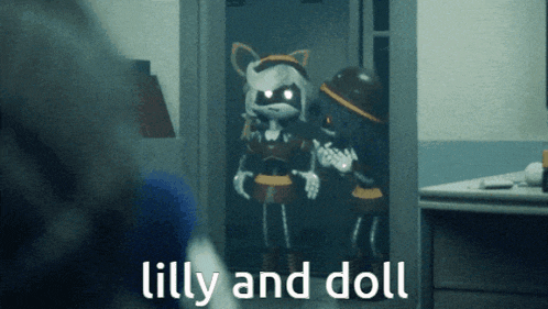two dolls are standing next to each other and the words lilly and doll are visible