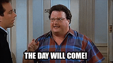 a man with glasses and a plaid shirt says the day will come .