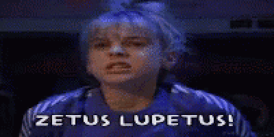 a girl in a blue jacket is saying zetus lupetus !