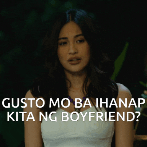 a woman in a white dress is asking " gusto mo ba ihanap kita ng boyfriend "