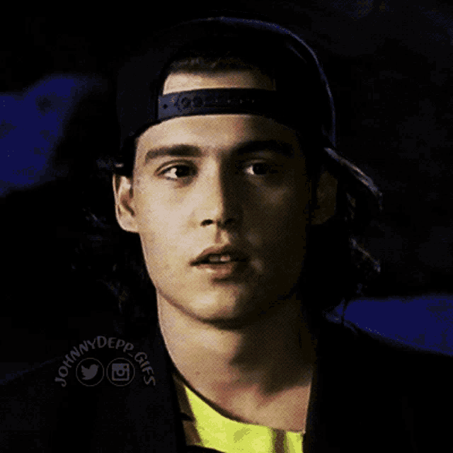 a close up of a man wearing a hat with the words johnny depp gifs on the bottom right