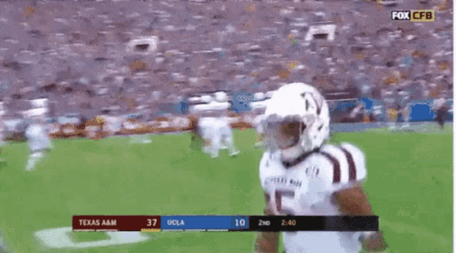 a football game between texas a & m and ucla is being shown on fox cbs