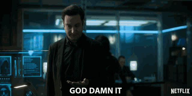 a man in a suit says god damn it in front of a netflix logo