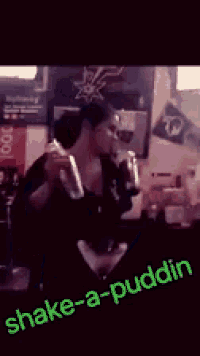 a picture of a man shaking a drink with the words shake-a-puddin