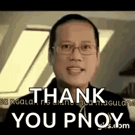 a man wearing glasses is giving a speech and saying `` thank you pnoy '' .