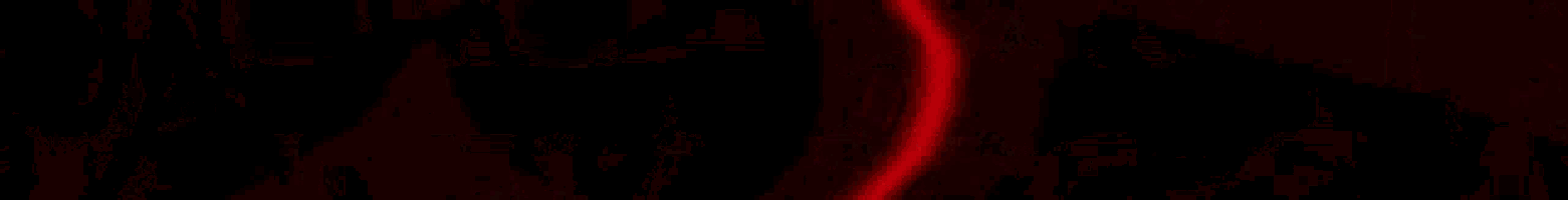 a blurred image of a red background with a few white lines