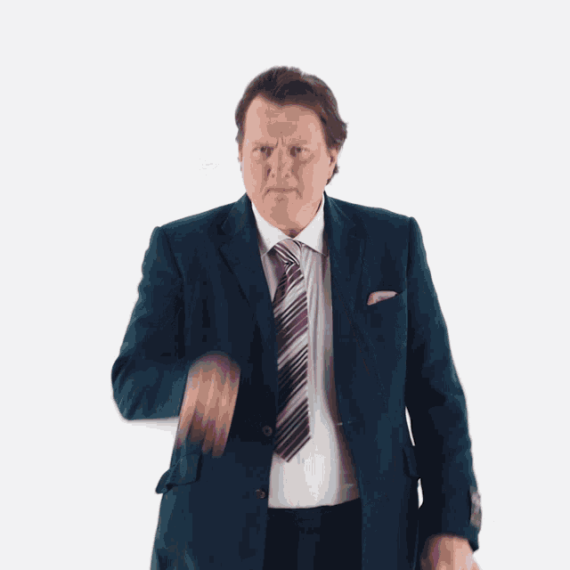 a man in a suit and tie making a funny face