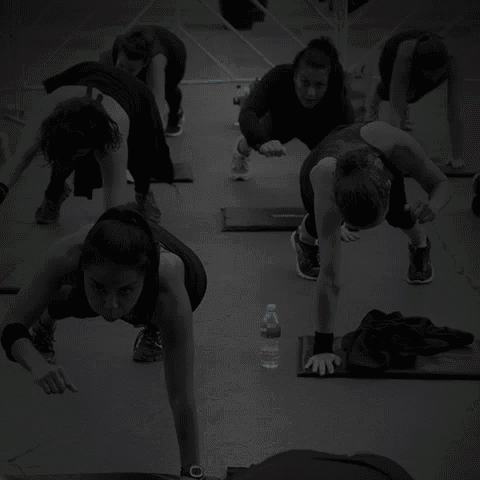 a group of people are doing push ups with the words quemar grasa crear musculo fortalecer articulaciones