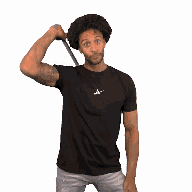 a man holding a stop sign in front of his face