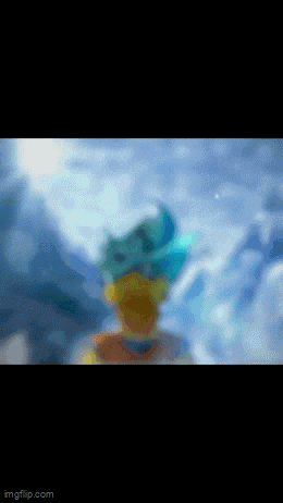 a blurry picture of a person with blue hair standing in the water