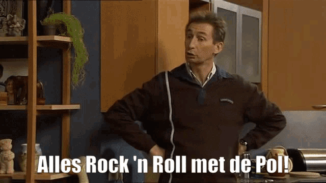 a man standing in a kitchen with his hands on his hips and the words alles rock 'n roll met de pol above him