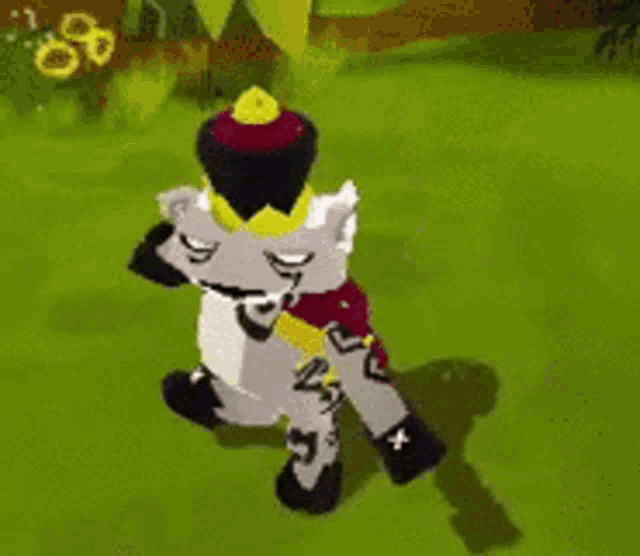 a cartoon character wearing a crown and a hat is dancing on a grassy field .