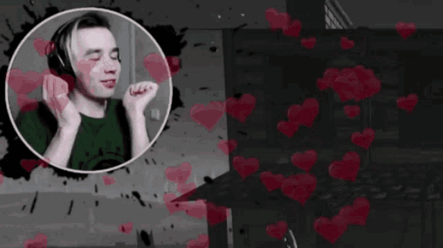 a man wearing headphones is surrounded by hearts on a black background