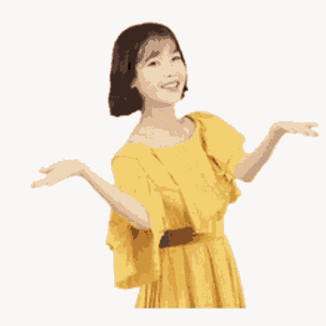 a woman in a yellow dress is standing with her arms outstretched .