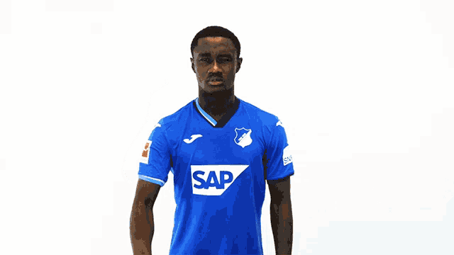 a man in a blue shirt with the word sap on the front