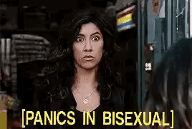a woman is standing in front of a glass door with the words `` panics in bisexual '' written on it .