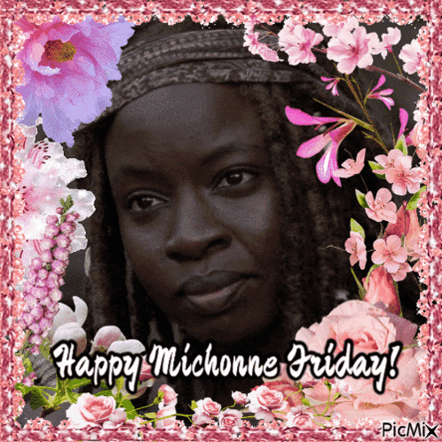 a picture of a woman with the words happy michonne friday