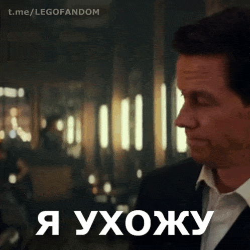 a man in a suit and tie says " i 'm sorry " in russian