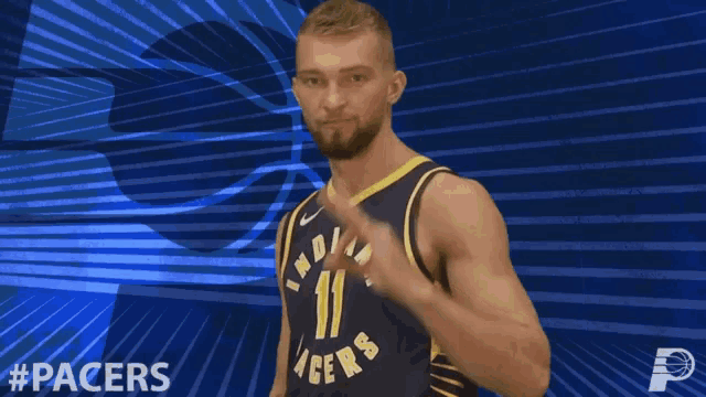 a basketball player for the indiana pacers giving the ok sign