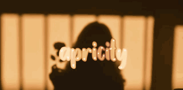 a woman 's shadow is cast on the wall with the word capricity