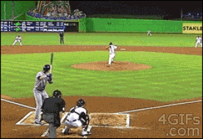 a baseball game is being played on a field with a stanley sign in the outfield