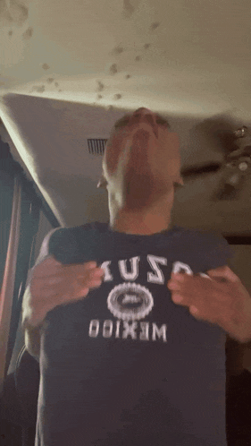 a man wearing a t-shirt that says ' usa ' on it