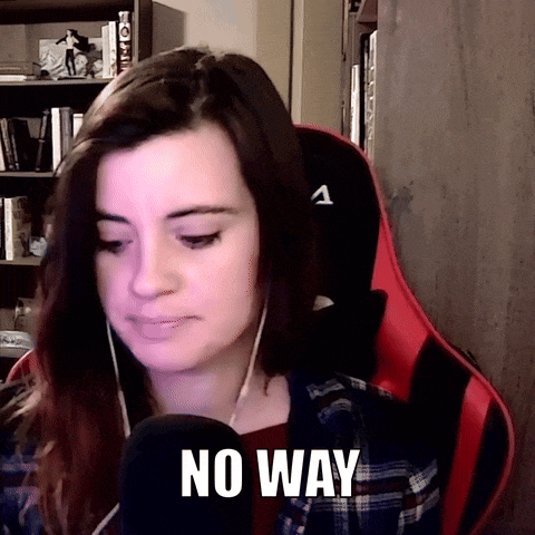 a woman in a red and black chair with the words no way on her face