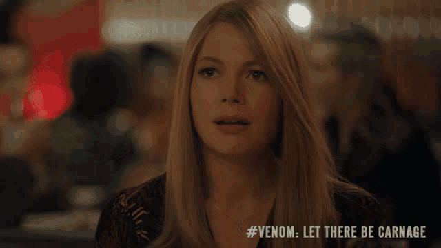 a woman says #venom let there be carnage on the bottom right