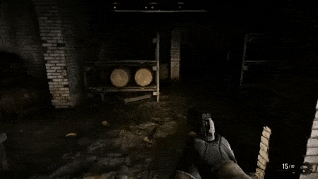 a person is holding a gun in a dark room with barrels on shelves .
